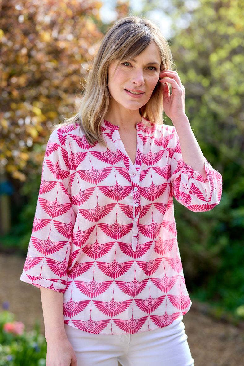 pink and white tunic